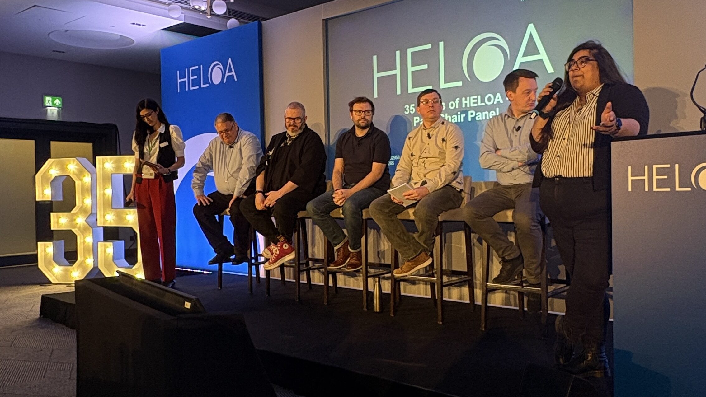 Image of 5 past HELOA chairs and 2 hosts of Q&A panel